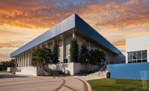 a photograph of youkey theatre at rp funding center in lakeland, florida, captured at sunset.