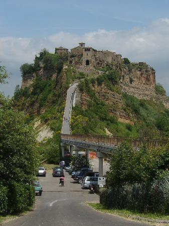 civita di bagnoregio is a town in the province of viterbo in central italy a frazione of the comune of bagnoregio 1 kilometre east from it