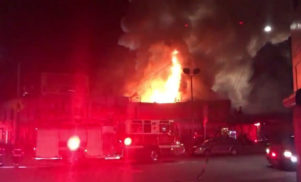 At least nine people dead and 25 missing after fire breaks out at 100% Silk warehouse party in Oakland