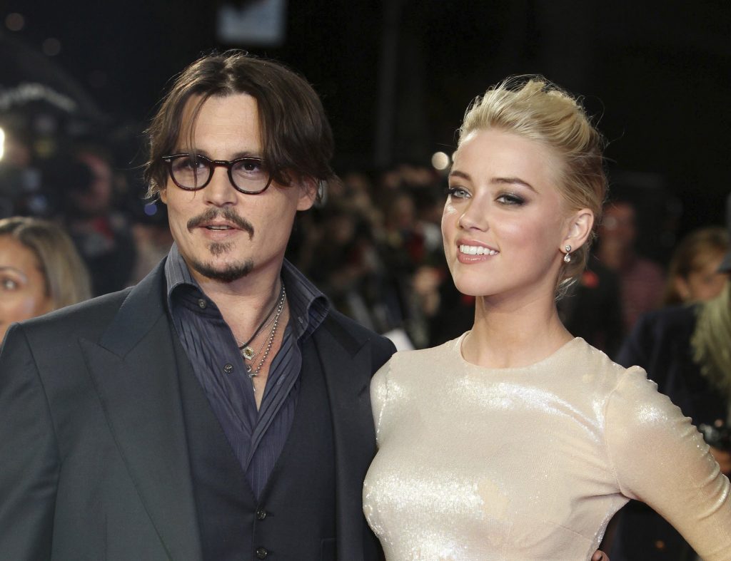 Johnny Depp sues ex-wife for $50 million in defamation ...
