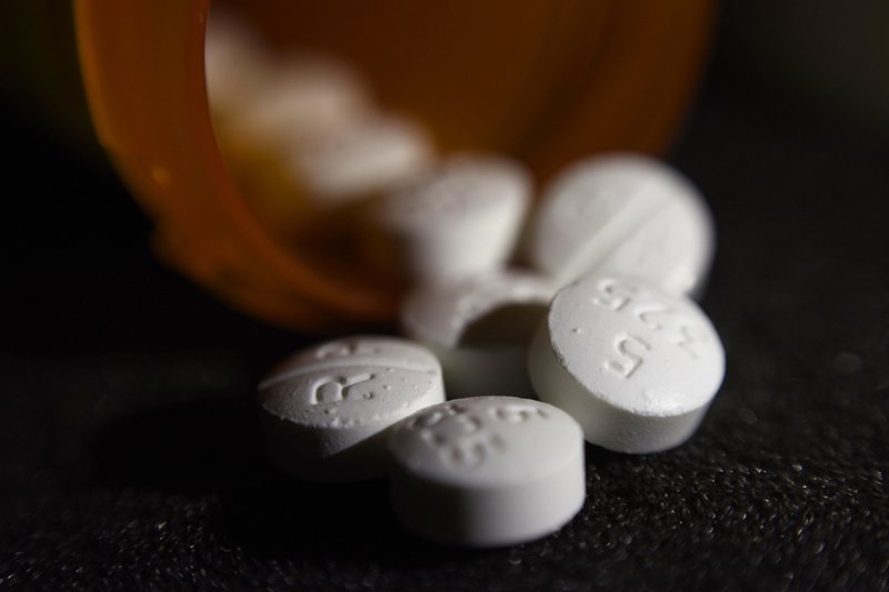 FILE - This Tuesday, Aug. 15, 2017, file photo shows an arrangement of pills of the opioid oxycodone-acetaminophen in New York. Newly released federal data shows how drugmakers and distributors increased shipments of opioid painkillers across the U.S. as the nation’s addiction crisis accelerated from 2006 to 2012. (AP Photo/Patrick Sison, File) Federal data shows opioid shipments ballooned as crisis grew | FACTSWANTED