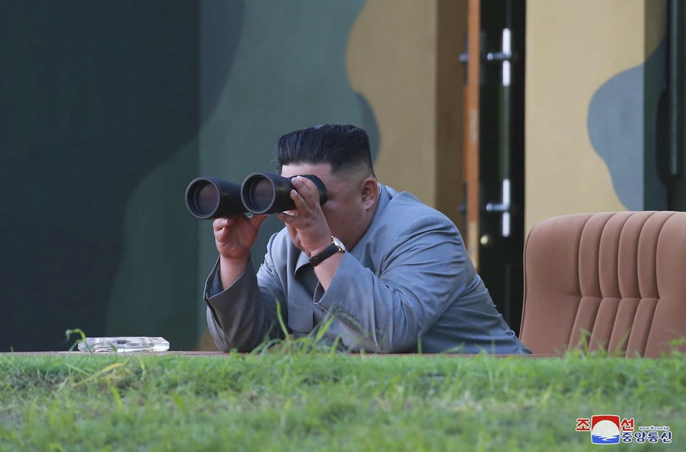 In this Thursday, July 25, 2019, photo provided on Friday, July 26, 2019, by the North Korean government, North Korean leader Kim Jong Un watches a missile test in North Korea. A day after two North Korean missile launches rattled Asia, the nation announced Friday that its leader Kim supervised a test of a new-type tactical guided weapon that was meant to be a "solemn warning" about South Korean weapons introduction and its rival's plans to hold military exercises with the United States. Independent journalists were not given access to cover the event depicted in this image distributed by the North Korean government. The content of this image is as provided and cannot be independently verified. Korean language watermark on image as provided by source reads: "KCNA" which is the abbreviation for Korean Central News Agency. (Korean Central News Agency/Korea News Service via AP) | FACTSWANTED In this Thursday, July 25, 2019, photo provided on Friday, July 26, 2019, by the North Korean government, North Korean leader Kim Jong Un watches a missile test in North Korea. A day after two North Korean missile launches rattled Asia, the nation announced Friday that its leader Kim supervised a test of a new-type tactical guided weapon that was meant to be a "solemn warning" about South Korean weapons introduction and its rival's plans to hold military exercises with the United States. Independent journalists were not given access to cover the event depicted in this image distributed by the North Korean government. The content of this image is as provided and cannot be independently verified. Korean language watermark on image as provided by source reads: "KCNA" which is the abbreviation for Korean Central News Agency. (Korean Central News Agency/Korea News Service via AP) | FACTSWANTED