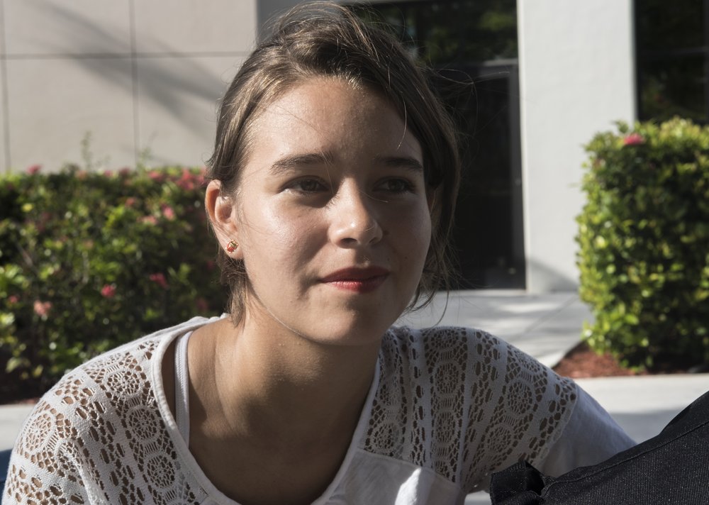 In this Tuesday, July 16, 2019 photo, Maria Masferrer is shown on campus at Florida International University in Miami. The 20-year old college student, who recently became a U.S. citizen, said President Trump's controversial comments directed at four liberal congresswomen could backfire and could stir immigrants along with first and second-generation Americans away from the Republican Party. (AP Photo/Ellis Rua) Trump voters cringe and shrug at tweets while Democrats rage | FACTSWANTED