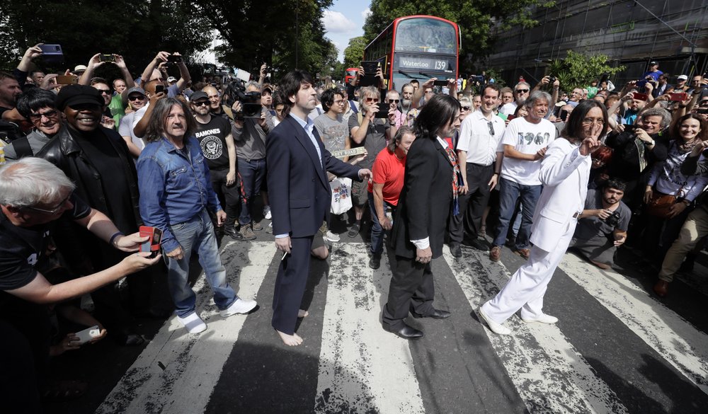 Fans recreate Beatles' Abbey Road cover shot 50 years on | FACTSWANTED Fans recreate Beatles' Abbey Road cover shot 50 years on | FACTSWANTED
