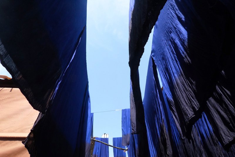 Indigo scarves drying in the sun. You can ask anyone in the medina to take you to Souk des Teinturiers, the dyers's area south of Souk Chouari (the carpentry area) and they will take you (for a tip). The dyeing process is something to see.