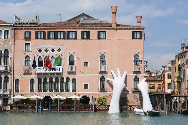 "Support," by Lorenzo Quinn at the Venice Biennale.