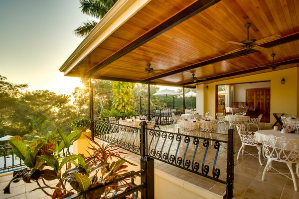 Covered patio looking out over the jungle landscape at San Ignacio Resort Hotel