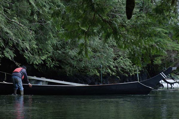 Joe Martin with one of his canoes in Clayoquot Sound.