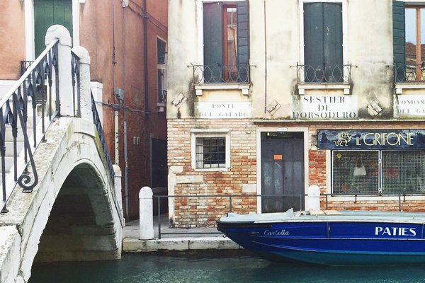 Boats in the canals in Venice, Italy.
