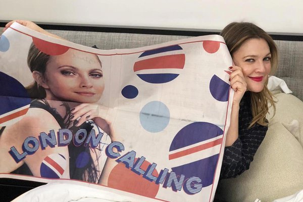 Drew Barrymore with Flower Home London poster.