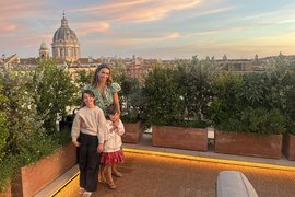 family photo on the rooftop at Hotel Bulgari in Rome