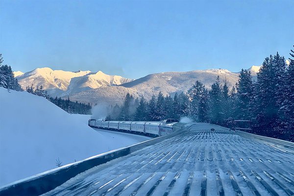 Train travel through Canada.
