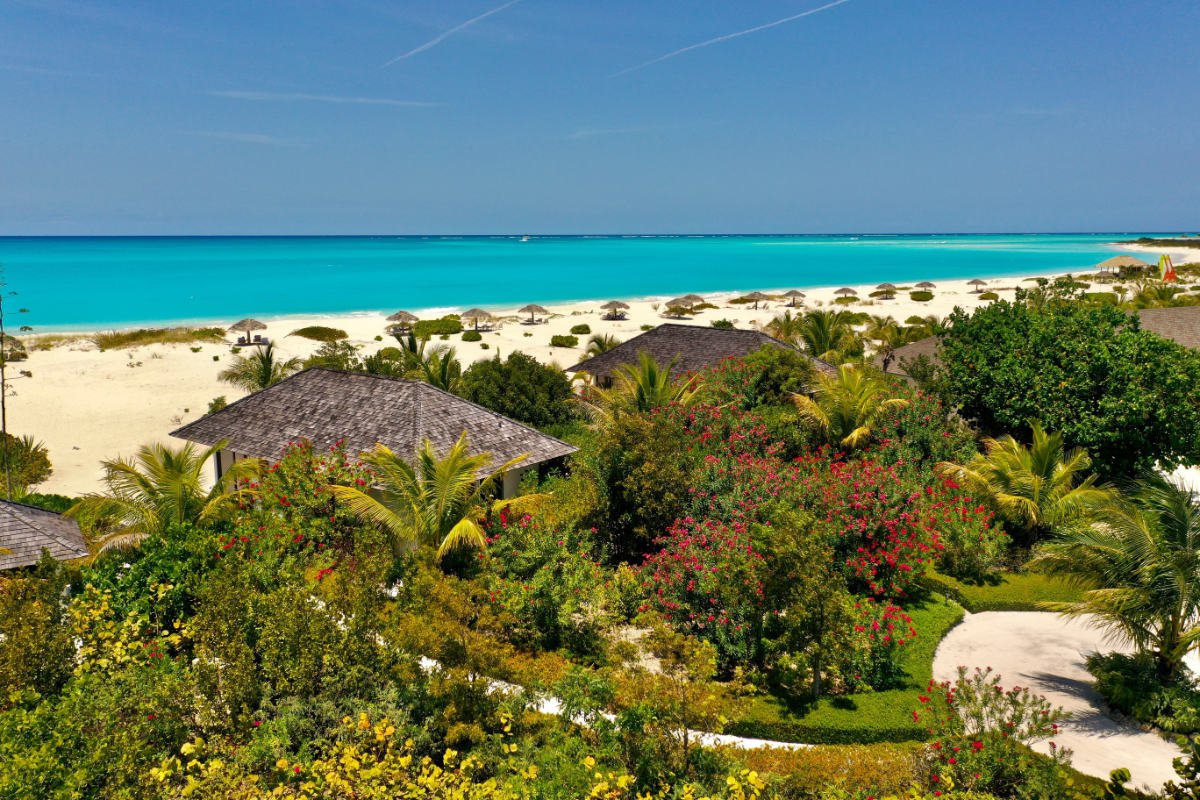 The cottages along the beach at Pine Cay. The cottages along the beach at Pine Cay.