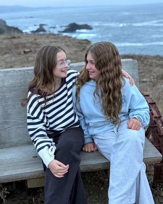 girls on a bench on a beach girls on a bench on a beach