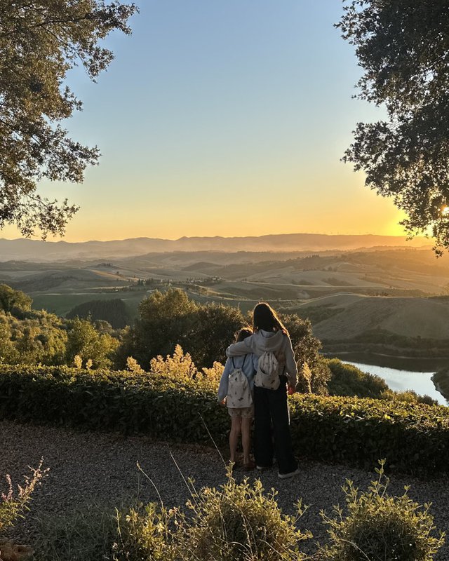 sisters watch the sunset