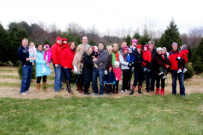 Families from Virginia, Pennsylvania and Maryland gather at Breezy Tree Farm in Westminster, Md. (Photo: Lyn Leyland Photography) 2012_12_christmastree1