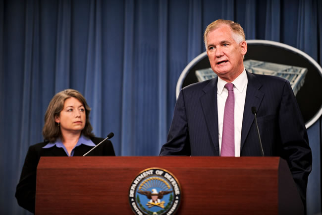 Deputy Secretary of Defense William Lynn talks as Assistant Secretary of Defense for Operational Energy Plans and Programs Sharon Burke looks on during the release of the Department of Defense's Operational Energy Strategy on Tuesday at the Pentagon. 2011_06_williamlynn