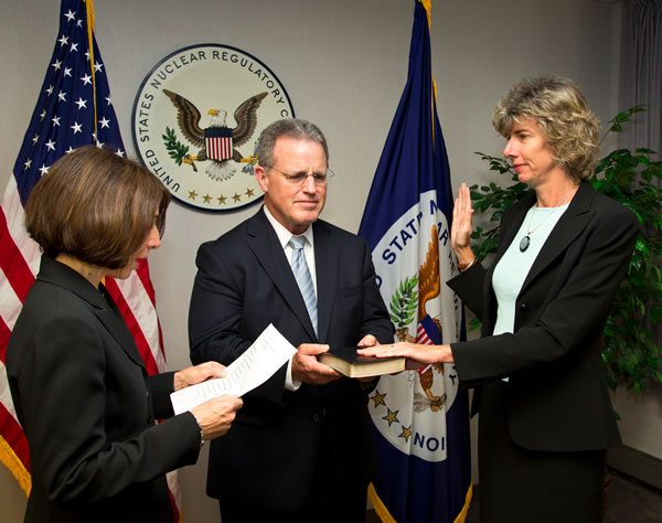Dr. Allison M. Macfarlane (right) is administered the oath of office by NRC Chief Human Capitol Officer Miriam Cohen (left) with chief of staff designee Phillip Niedzielski-Eichner. 2012_07_allisonmacfarlane