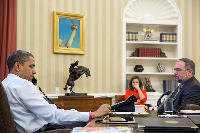 President Barack Obama receives an update on the ongoing response to Hurricane Sandy during a conference call with FEMA Administrator Craig Fugate, Dr. Rick Knabb, Director of the National Hurricane Center, and John Brennan, Assistant to the President for Homeland Security and Counterterrorism, in the Oval Office, Oct. 26, 2012. Alyssa Mastromonaco, Deputy Chief of Staff for Operations, and Richard Reed, Deputy Assistant to the President for Homeland Security, are seated at right. (Official White House Photo by Pete Souza) 2012_10_8125211253_1e572520bc_z