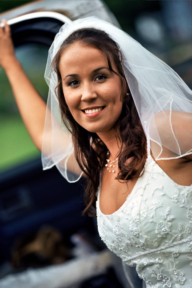 50-brideatdoorofcar-jpg