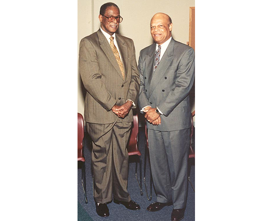 Paul E. Harris (left) and Jim Harrison