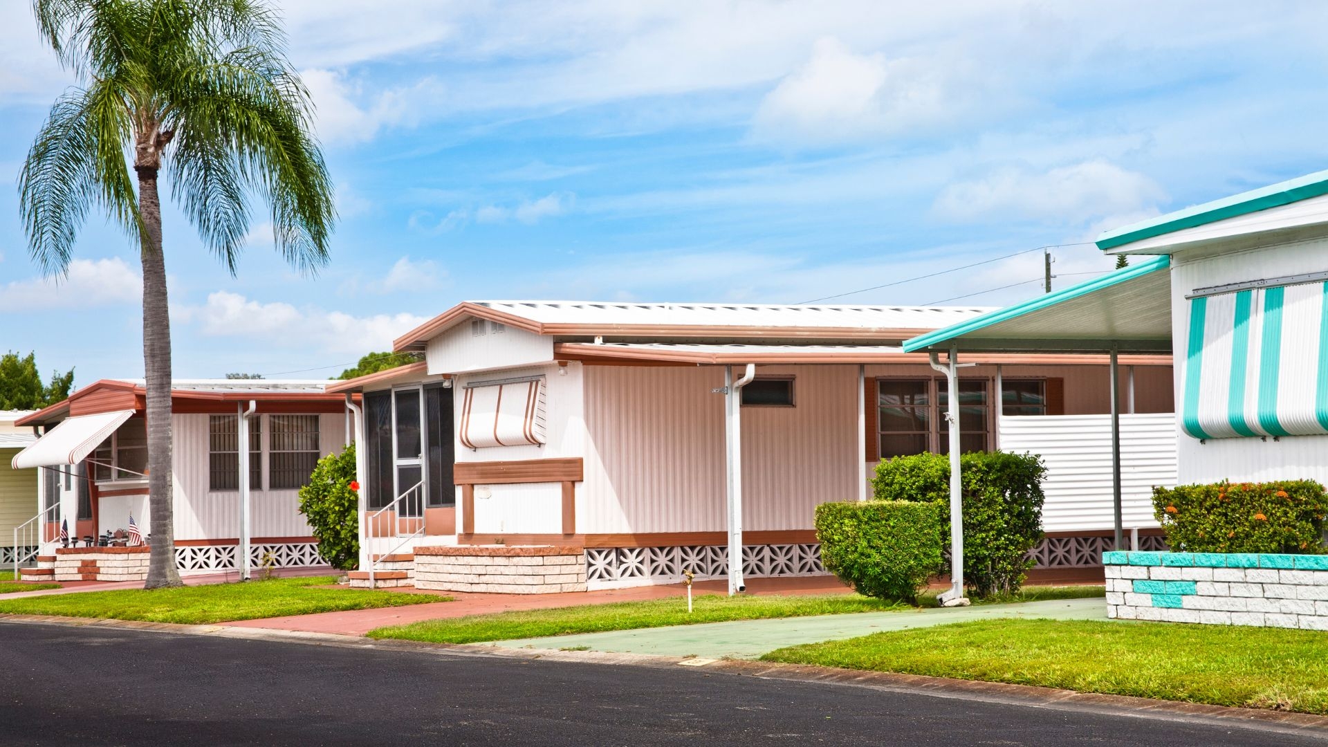 What types of environments are outdoor fiber optic cables designed to withstand?