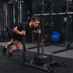 What Types of Workouts Can You Expect at HYROX Gym?
