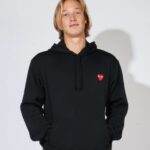 Discover Avant-Garde Holiday Fashion with Comme Des Garçons