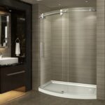 Designing a Cohesive Bathroom: Pairing Frameless Glass Doors with Tile, Lighting, and Fixtures
