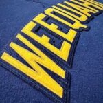 How to Choose Between Acrylic Felt and Tackle Twill for Lettering