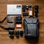 What Are the Essential Photography Gear Items for Travel Photographers?