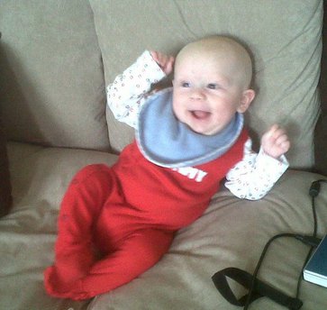 zac doing his victory claim of the sofa!