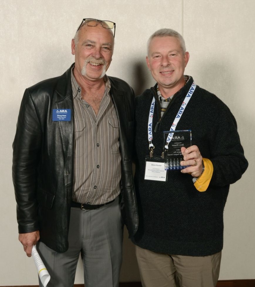 Steve Houser, right, receives the 2021 ARA Leadership Impact Award