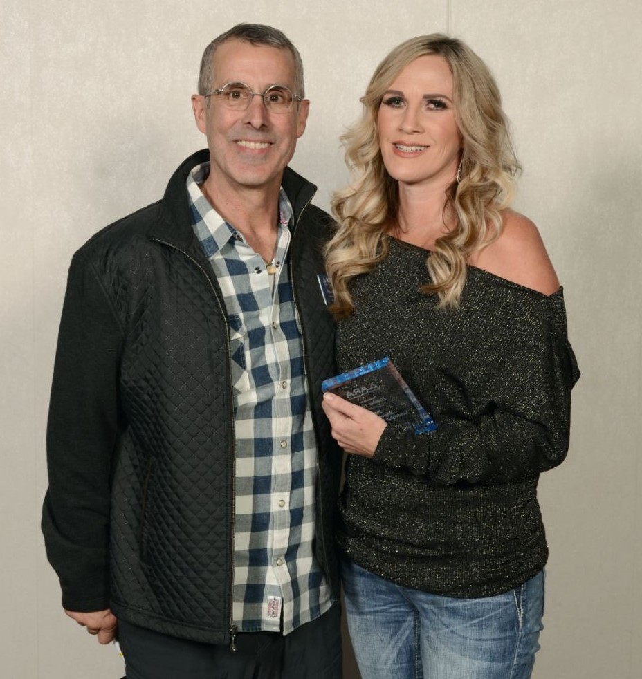 Heather Gray, right, receives the 2021 ARA Leadership Impact Award