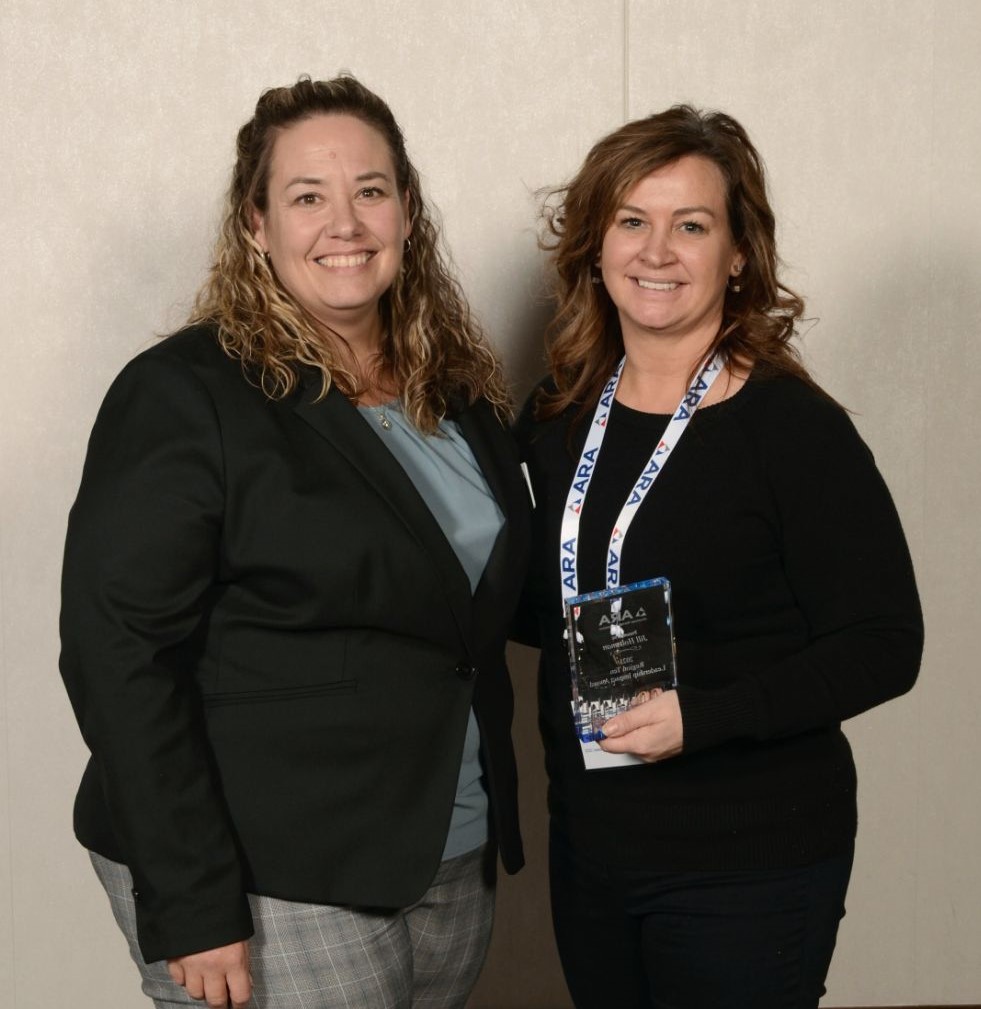 Jill Holtsman, right, receives the 2021 ARA Leadership Impact Award