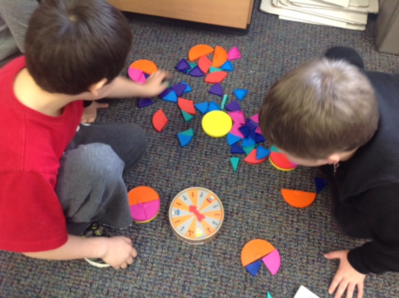 Third grade Lesson Exploring Fractions with Games and Manipulatives