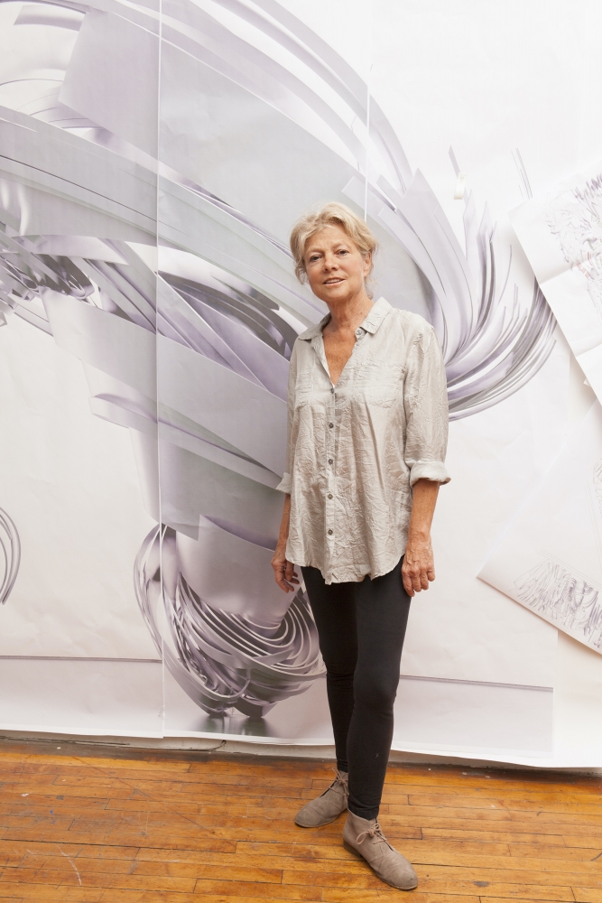 Color photographic portrait of Alice Aycock in her studio