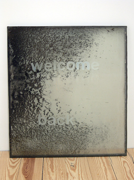 Welcome, 2009, city dust and pollution on insulated window