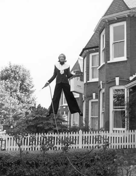 Untitled (Model with Garden Hose in Garden) England, 1994, Archival Pigment Print