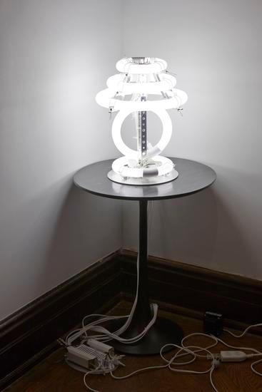 Untitled (desk lamp), 2014, Fluorescent lights, ballasts, aluminum frame, wire 