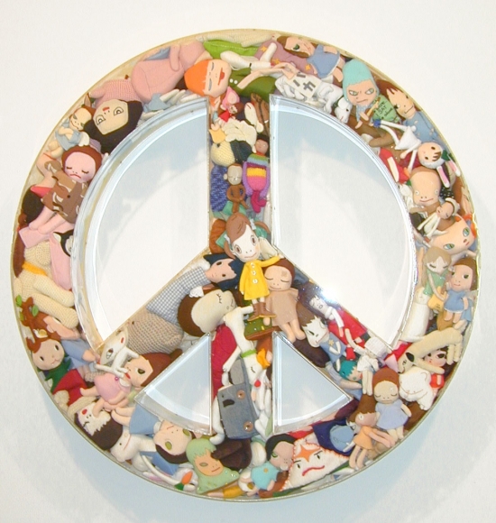 peace sign made of small dolls by yoshimoto nara