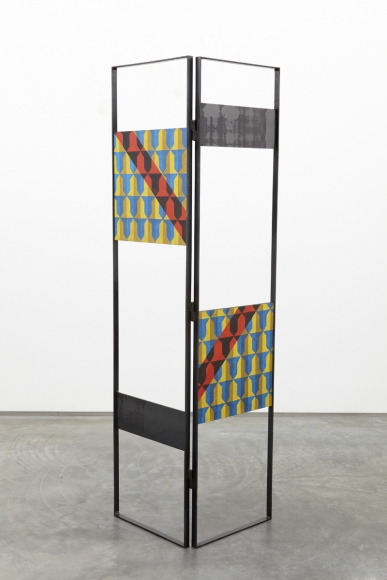 sculpture by melissa gordon with black steel frame and patterned wood panels