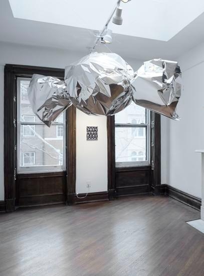 Untitled (candy), 2014, Mirror film, aluminum, motor