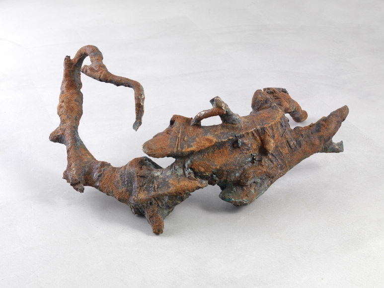 an iron and bronze abstract sculpture by jay heikes