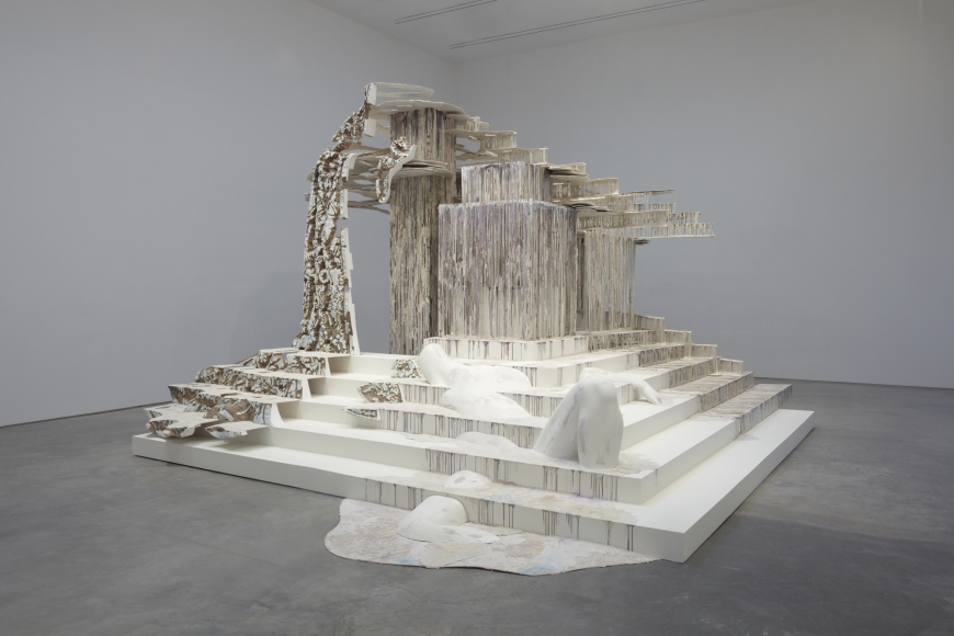 an architectural installation of dripping polymer gypsum by the sculptor Diana Al-Hadid