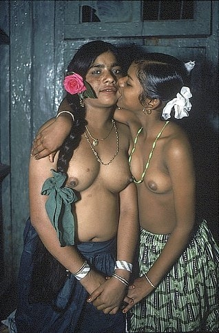 Lata Bites Asha, Bombay, India (from Falkland Road Series), 1978, Cibachrome