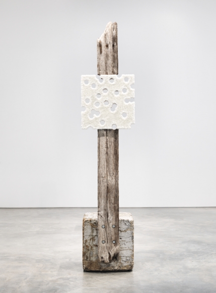 a glory hole white painting set on a piece of driftwood to make a sculptural artwork by donald moffett