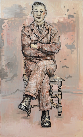 portrait of a seated man with crossed arms