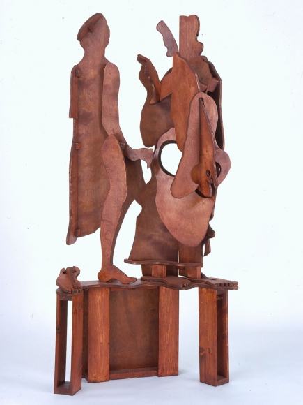 wooden figures on pedestal by rachel feinstein