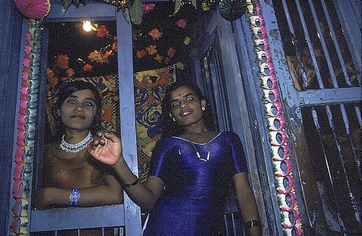 Girls Looking Out of Cages on Falkland Road at Night, Bombay, India (from Falkland Road Series), 1978, Cibachrome